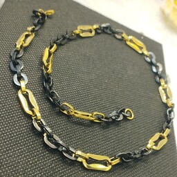 زنجیر پسرانه استیل رنگ ثابت رنگ طلایی و مشکی مد1