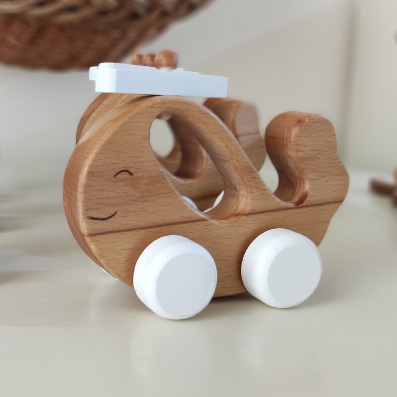 اسباب بازی چوبی ماشین  مدل دلفین چرخدار از جنس چوب راش و پوشش روغن گیاهی طول 15 سانت