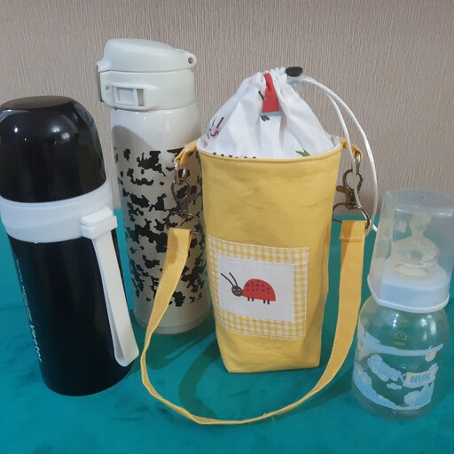 کاور و نگهدارنده ی بطری آب  و  ماگ و  شیشه شیر کودک