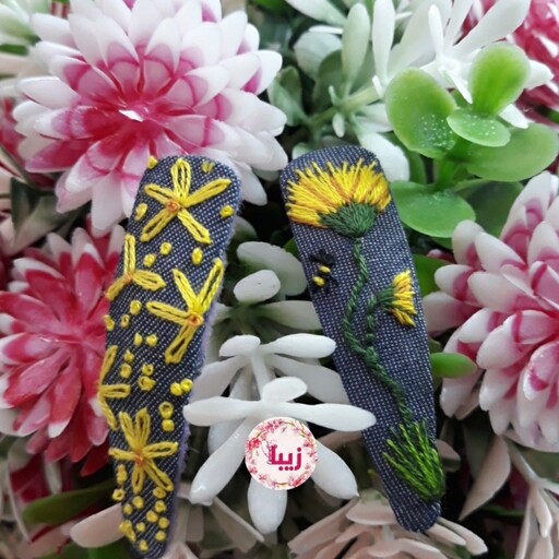 گیره سر گلدوزی شده با دست ایده گرفته از گلهای طبیعی در طبعیت جنس پارچه لی رنگ کاربنی روشن