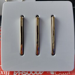 کلید پریز کلید سه پل کریستال سفید طلایی آسیا الکتریک با نشان استاندارد ملی 