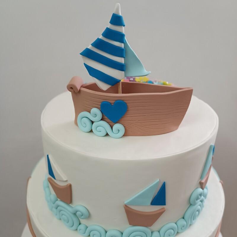ماکت کیک طرح قایق و دریا دو طبقه.ویژه عکاسی و هدیه .جنس خمیر فوندانت و فوم  قابلیت تغییر سایز و رنگ و مدل