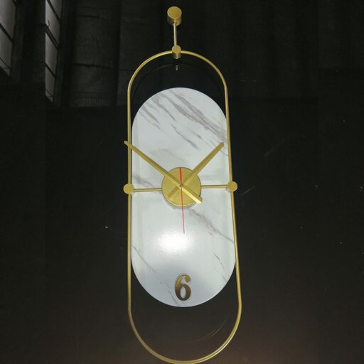 ساعت دیواری مدرن فلزی با ده سال ضمانت رنگ و موتور تایوانی ارامگرد درجه یک اصل. بسته‌بندی و ارسال رایگان 
