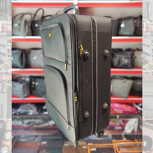چمدان سایز متوسط . ارسال رایگان . کیفیت مطلوب . دارای دسته تراول . ابعاد  40.60.25