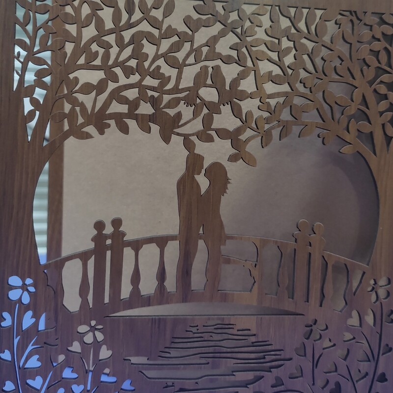 دفتربله برون چوبی با طرح زوج عاشق به سبک روستیک