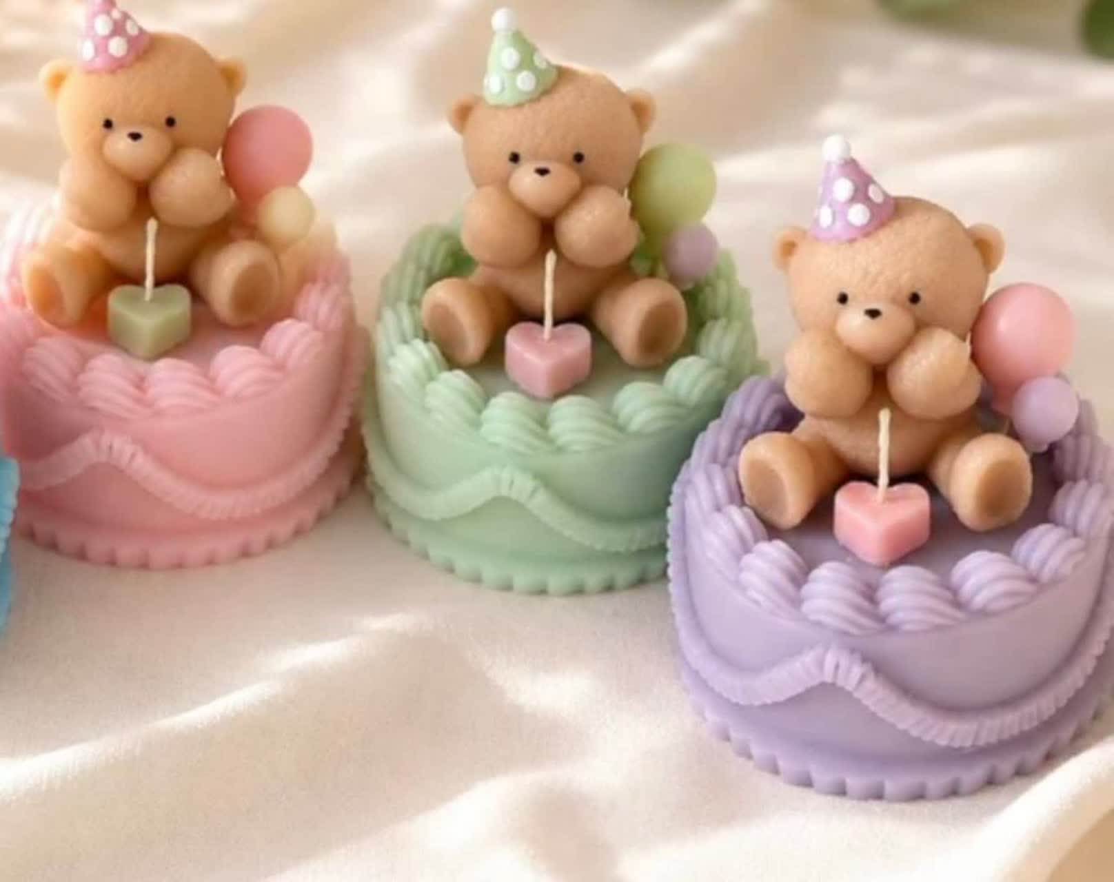 Birthday cake candle and teddy
